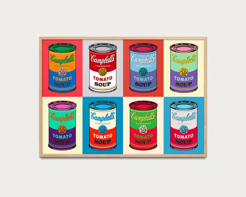 Une œuvre d'art encadrée représente huit boîtes de soupe à la tomate Campbell's de différentes couleurs vives, disposées en deux rangées de quatre sur un fond blanc.